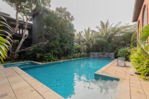Bassein majutusasutuses 2 BHK Property with Garden and Pool või selle lähedal