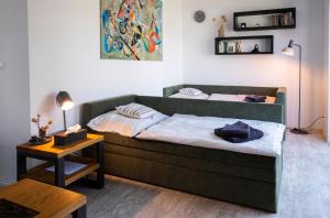 Postel nebo postele na pokoji v ubytování Apartmán Sychrova