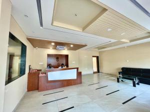 a lobby of a hospital with a waiting room at Hotel ROCKBAY, Puri Swimming-pool, near-sea-beach-and-temple fully-air-conditioned-hotel with-lift-and-parking-facility in Puri