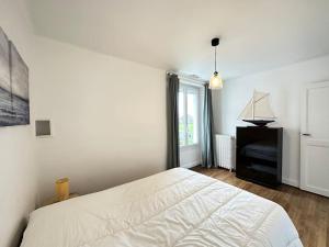 Posteľ alebo postele v izbe v ubytovaní Maison cosy avec jardin & garage