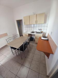Kuchyňa alebo kuchynka v ubytovaní Aquatherma Apartman