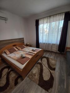Posteľ alebo postele v izbe v ubytovaní Aquatherma Apartman