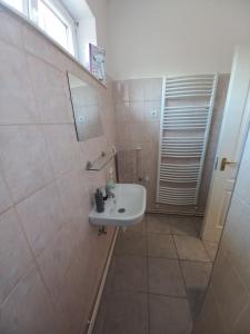 Kúpeľňa v ubytovaní Aquatherma Apartman