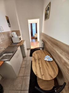 Kuchyňa alebo kuchynka v ubytovaní Aquatherma Apartman
