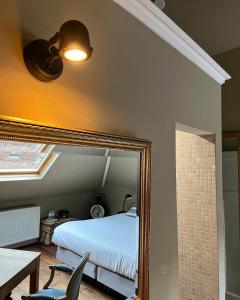 Giường trong phòng chung tại B&B Le flaneur