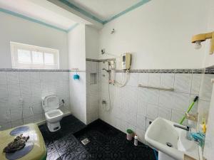 Koupelna v ubytování Galle Side Guest House