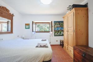 Ένα ή περισσότερα κρεβάτια σε δωμάτιο στο Agriturismo Campo al Crognolo +38 φωτογραφίες