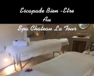 two beds in a room with the wordsrepealed bitten fire air spa chicago at Domaine La Tour - SPA - Jacuzzi - Sauna - Massage - 4 SAISONS - Piscine Chauffée Toute l'année - Heated POOL - 800m City Centre Nyons in Nyons