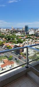 a view of a city from a balcony at Espacio C Montevideo con estacionamiento in Córdoba