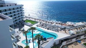 an aerial view of the hotel and the ocean at Pearly Grey Ocean Club Apartments & Suites in Callao Salvaje