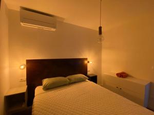 Postel nebo postele na pokoji v ubytování Apartments Bogic