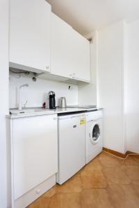A kitchen or kitchenette at Seafront studio with beach view in the center of Los Cristianos
