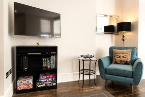TV a/nebo společenská místnost v ubytování Gresham House