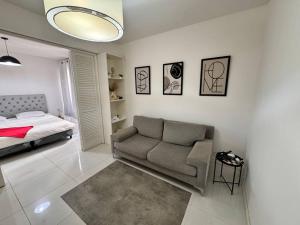 Khu vực ghế ngồi tại Modern Apartment in Mendoza Capital