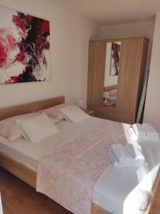 Postel nebo postele na pokoji v ubytování Apartment Nirvana
