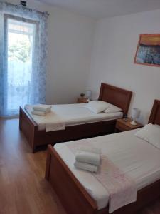 Postel nebo postele na pokoji v ubytování Apartment Nirvana