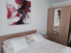 Postel nebo postele na pokoji v ubytování Apartment Nirvana