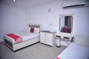 Ένα ή περισσότερα κρεβάτια σε δωμάτιο στο Hotel Sanri Villa Katunayake