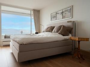 Postel nebo postele na pokoji v ubytování Baltic Panorama Suite + 24 fotografií