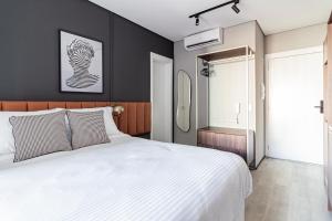 Iconyc Charlie Ibirapuera Hotel客房内的一张或多张床位