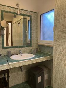 Ванная комната в Sweet Home Lunì