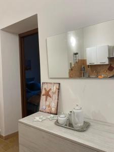 Η κουζίνα ή μικρή κουζίνα στο Sweet Home Lunì