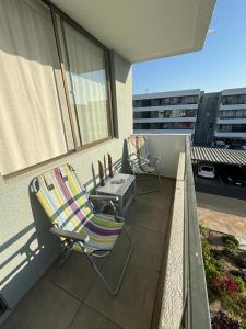 En balkon eller terrasse på Acogedor departamento arica