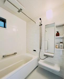 Koupelna v ubytování JoyHome 天下茶屋駅7分4LDK一軒家 難波梅田黒門関空直通 無料駐車場