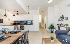 Kuchyň nebo kuchyňský kout v ubytování Apartments Solis Lacus Penthouse