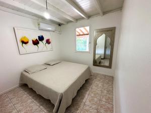 Postel nebo postele na pokoji v ubytování Maison à 3 min à pied de la plage + 16 fotografií