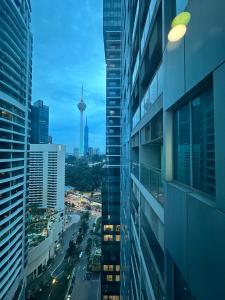 Nespecifikovaný výhled na destinaci Kuala Lumpur nebo výhled na město při pohledu z hostelu