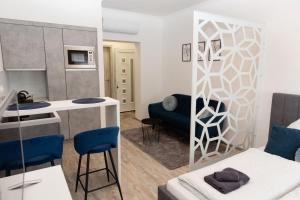 Posezení v ubytování Berzsenyi Apartmanház