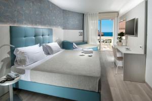 Postel nebo postele na pokoji v ubytování Hotel Prestige + 26 fotografií