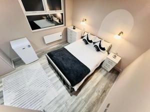 En eller flere senger på et rom på Central studios: Exceptional standard for a memorable stay
