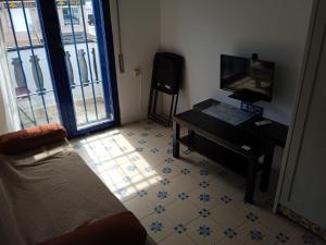 Telewizja i/lub zestaw kina domowego w obiekcie Antilla Riad