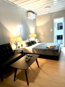Postel nebo postele na pokoji v ubytování H&T PJ Gasing - Cabin Studio - Netflix & Free Parking