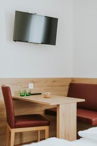 TV a/nebo společenská místnost v ubytování Gasthaus zur Waldschenke