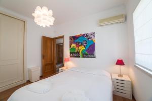 Postel nebo postele na pokoji v ubytování BmyGuest - Casa da Hera Villa Meco + 32 fotografií