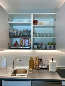 A cozinha ou cozinha compacta de Nuevo Moderno Apartamento de Lujo