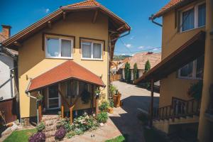 an aerial view of a house with at Balázs Panzió in Corund +15 photos