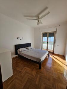 Ein Bett oder Betten in einem Zimmer der Unterkunft Appartamento da simba