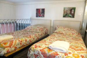 Ένα ή περισσότερα κρεβάτια σε δωμάτιο στο Casa San Telmo 61