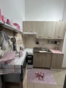 Virtuvė arba virtuvėlė apgyvendinimo įstaigoje Casa Rosa