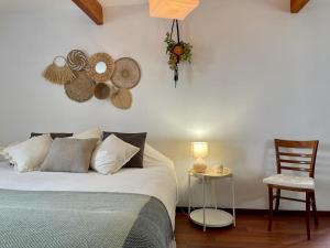 Giường trong phòng chung tại Wellness guesthouse Casa é Connosco