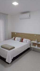 Postel nebo postele na pokoji v ubytování O mais belo Apartamento a 50 metros da praia de Costa Azul
