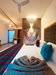 מיטה או מיטות בחדר ב-Dharma Place
