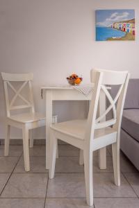 Posezení v ubytování Aeolis Hotel + 11 fotografií