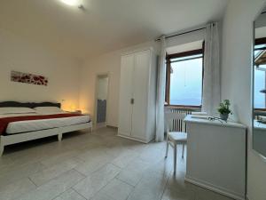 Rúm í herbergi á Monastero SS. Annunziata