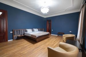 Rúm í herbergi á Golden Palace Hotel
