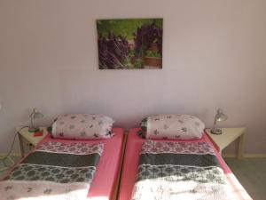 Ein Bett oder Betten in einem Zimmer der Unterkunft Pension Sonnenschein